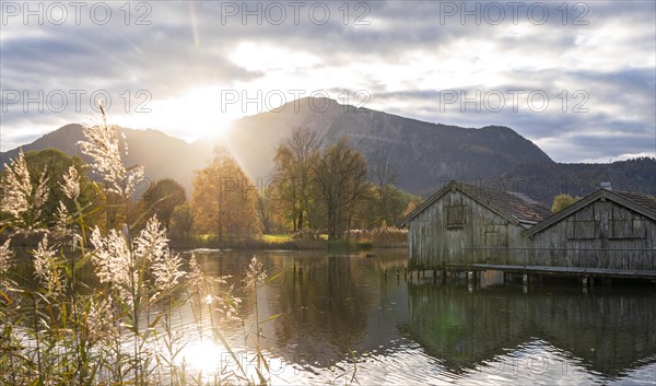 Boathouses at Lake Kochel in autumn