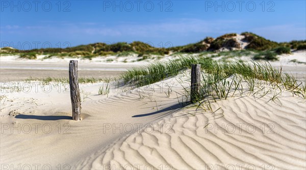 Beach with wooden planks and guard house