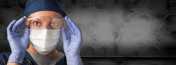 Female doctor or nurse wearing goggles