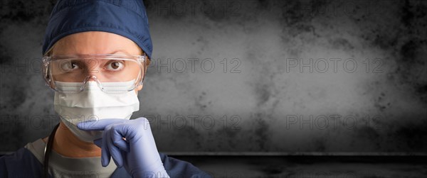 Female doctor or nurse wearing goggles