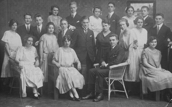 Group photo of an extended family in elegant clothing