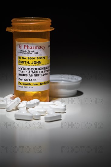 Hydrocodone pills and prescription bottle with non proprietary label. no model release required