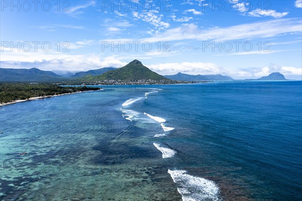 Aerial view of Flic en Flac beach with waves on the reefs