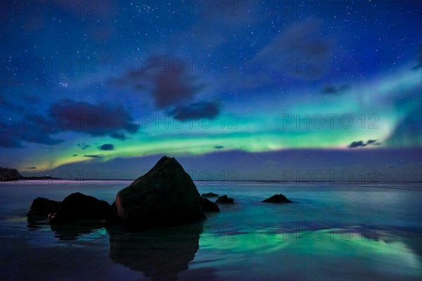 Aurora borealis northern lights on Skagsanden beach. Lofoten Islands