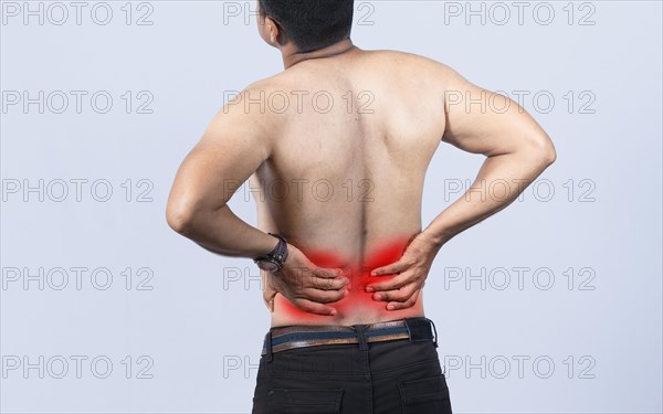 Person with back problems on isolated background