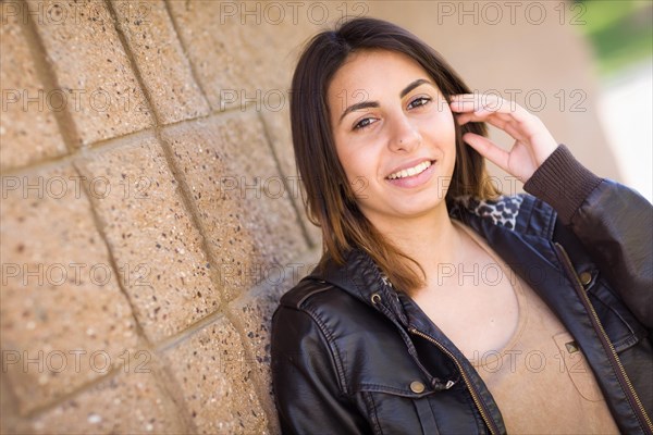 Beautiful happy mixed-race young woman portrait outside