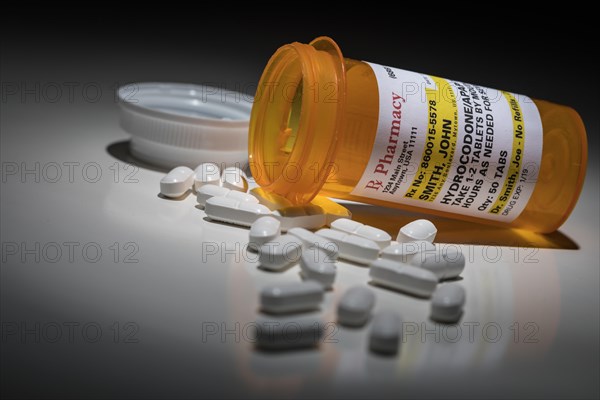 Hydrocodone pills and prescription bottle with non proprietary label. no model release required