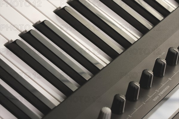 Abstract digital piano keyboard & controls