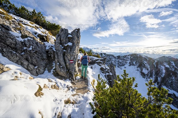 Young female hiker on hiking trail to Kramerspitz