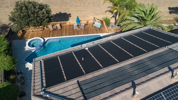 Thermal solar panels installed on the roof of a large house