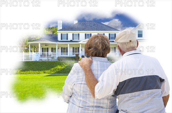 Daydreaming senior couple over custom home photo inside thought bubble