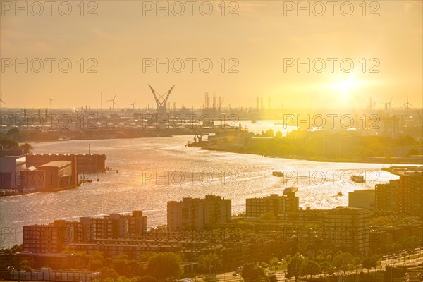 View of Rotterdam port and Nieuwe Maas river on sunset