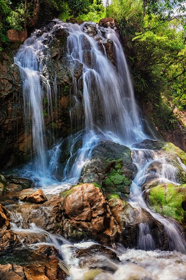 Tropical waterfal in jungle near Cat Cat Village near