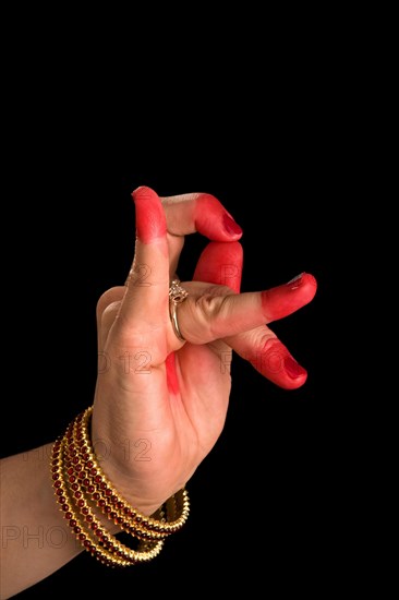 Woman hand showing Katakamukha hasta