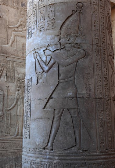 Depiction of the god Osiris on a column in the Kom Ombo temple on the Nile