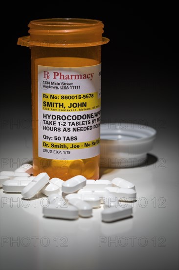 Hydrocodone pills and prescription bottle with non proprietary label. no model release required