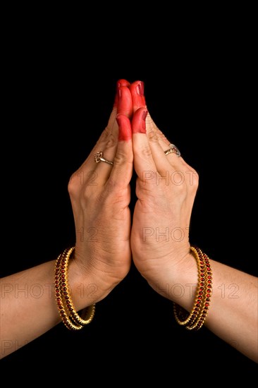 Woman hands showing Kapota hasta of indian classic dance Bharata Natyam