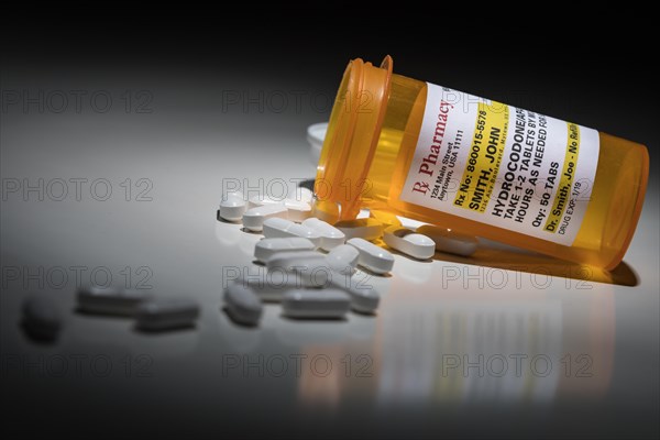 Hydrocodone pills and prescription bottle with non proprietary label. no model release required