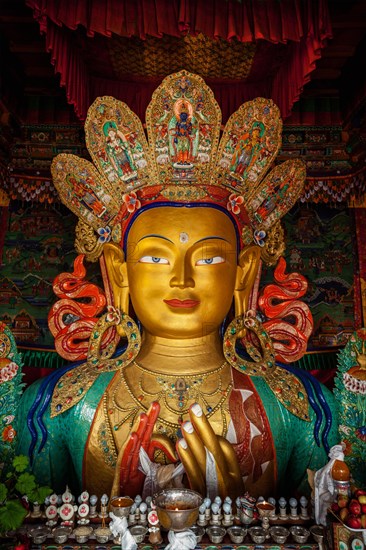 Maitreya Buddha statue face close up in Thiksey Gompa. Ladakh