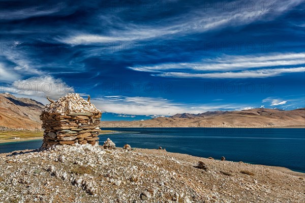 Stone cairn at Himalayan lake Tso Moriri