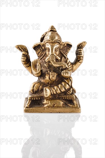 Ganesha bronze statue isolated on white background with reflection