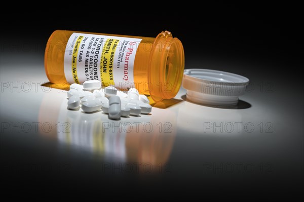 Hydrocodone pills and prescription bottle with non proprietary label. no model release required