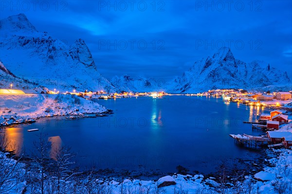 Reine village illuminated at night. Lofoten islands