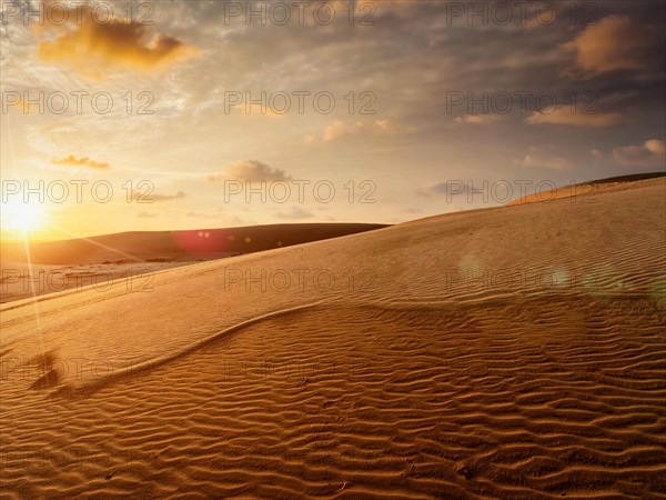 White sand dunes on sunrise