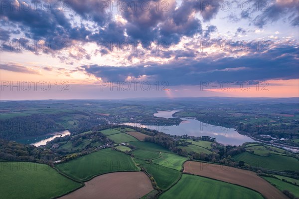 Sunset over Devon Fields and Farmlands from a drone