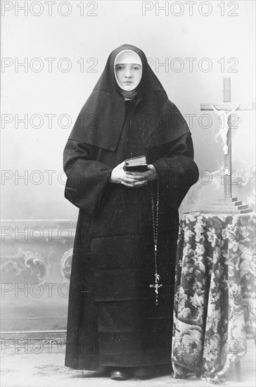 Nun with crucifix