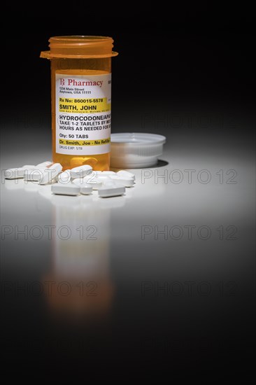 Hydrocodone pills and prescription bottle with non proprietary label. no model release required