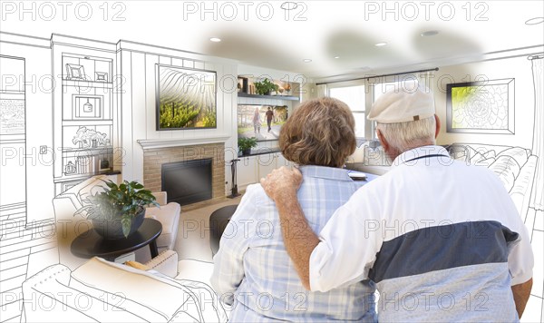 Curious senior couple looking over custom living room design drawing photo combination