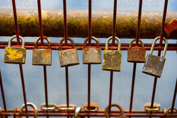 Padlocks on a lattice fence