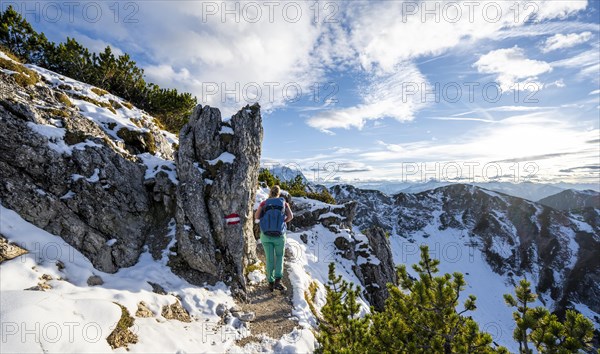 Young female hiker on hiking trail to Kramerspitz