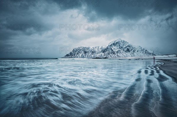 Waves on coast of Norwegian sea in fjord. Skagsanden beach