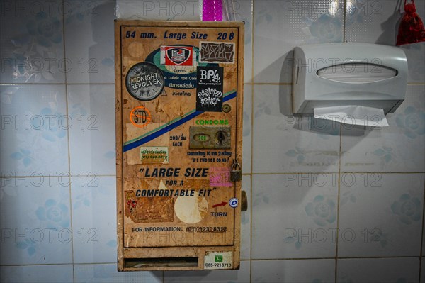 Condom vending machine in toilet in Beer Garden