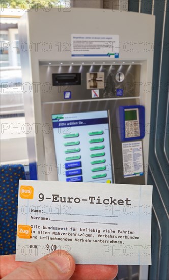 9-euro ticket with ticket vending machine photo montage in Kassel