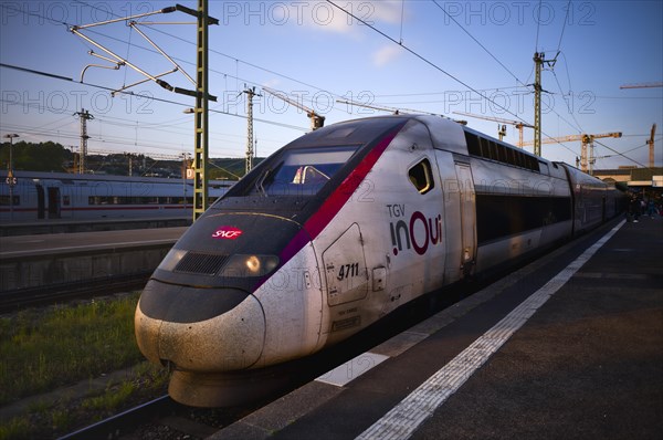 TGV 4711 of SNCF stands on platform