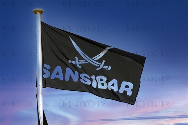 Flag of the cult restaurant Sansibar in the dunes of Ratum