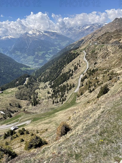 View from pass summit of mountain pass Jaufenpass to south ramp with southern ascent