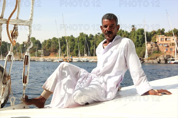 Portrait of a young Arab man wearing a galabaya