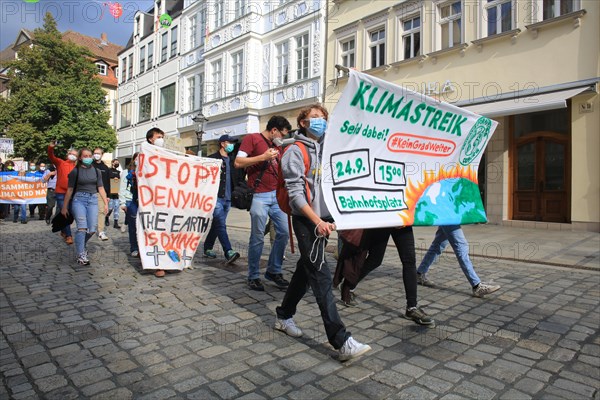 Protestors with banner at Fridays for Future event in Coburg as part of the worldwide climate strike. Coburg Germany