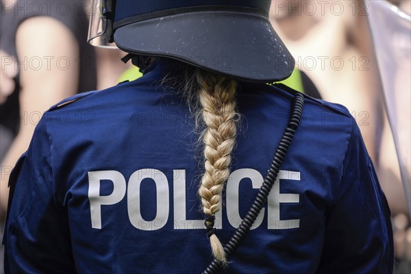 Policewoman with pigtail