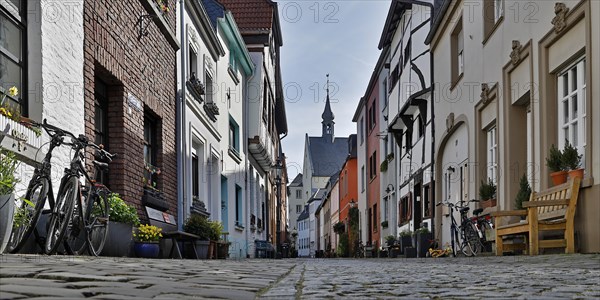 Tiefstrasse with the tower of the Paterskirche