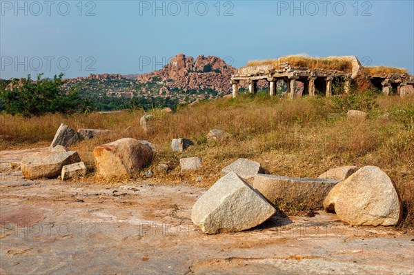 Ancient Vijayanagara Empire civilization ruins of Hampi now famous tourist attraction. Hampi