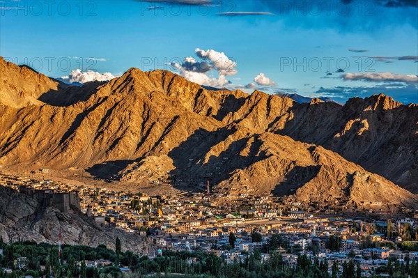 View of Leh town from above from Shanti Stupa on sunset. Ladakh