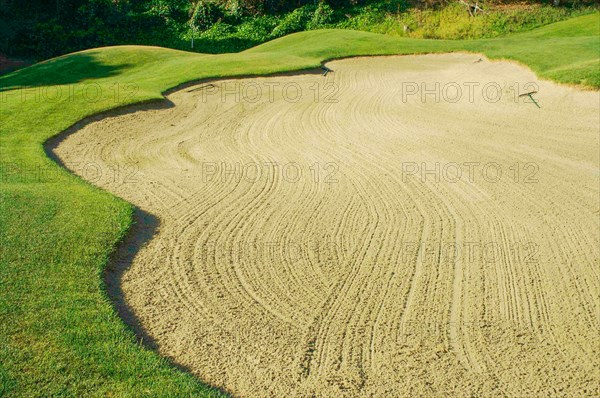 Abstract of golf course and sand bunker