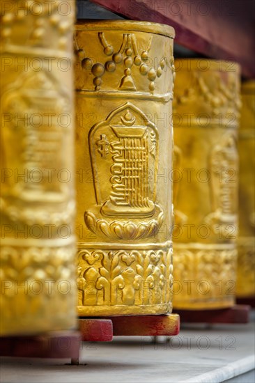 Prayer wheels with Om Mani Padme Hum mantra in Tabo Monastery. Tabo