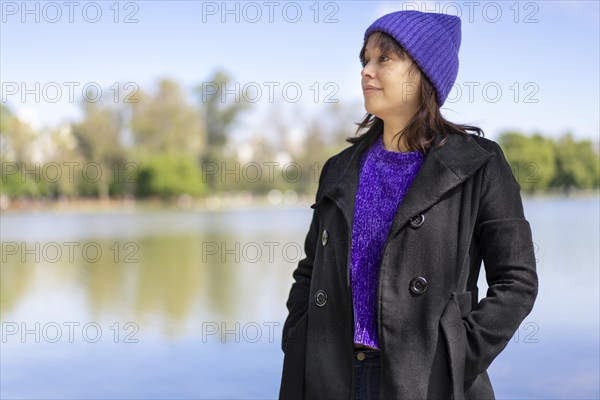 Portrait of a young Latin woman dressed in a pullover