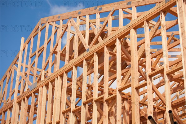 Wood home framing abstract at construction site